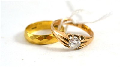 Lot 92 - An 18ct gold fancy band ring and a 9ct gold ring