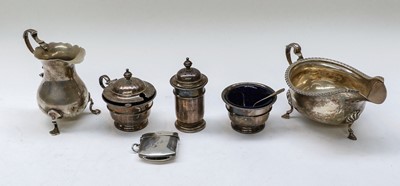 Lot 83 - A Collection of Silver, including: a sauceboat...