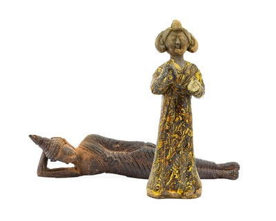 Lot 9 - A Chinese Earthenware Figure of a Maiden, in...