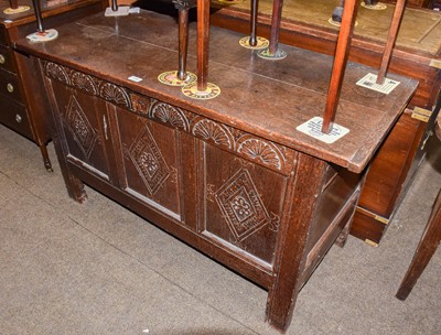 Lot 1340 - An 18th century lunette carved oak coffer,...