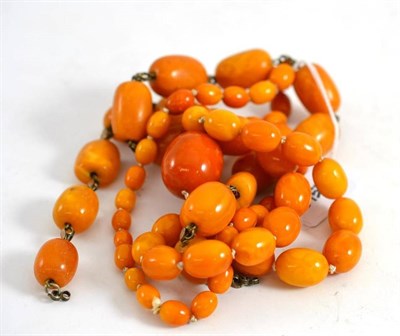 Lot 96 - An amber necklace and another similar