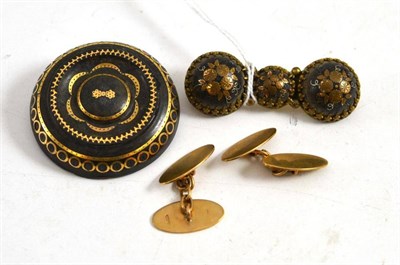 Lot 97 - Tortoiseshell and pique circular brooch, similar triple brooch and a pair of 9ct gold cufflinks