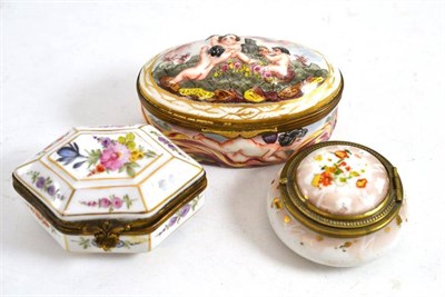 Lot 98 - Capodimonte style oval snuff box and cover with gilt metal mounts decorated with cherubs and...