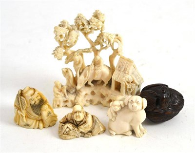 Lot 99 - Small carved ivory Chinese figure group, two ivory netsukes, netsuke carved as a frog on a...