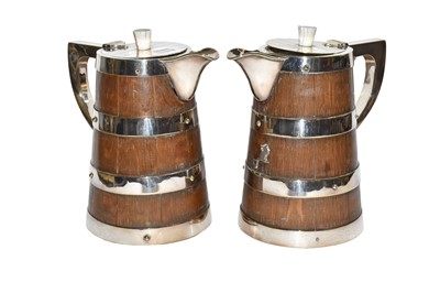 Lot 66 - A pair of early 20th century staved oak jugs,...