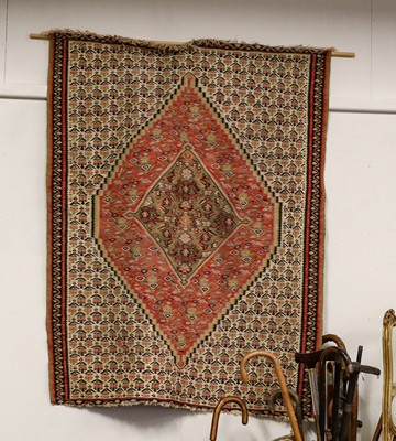 Lot 1113 - Senneh Kilim, the ivory field of boteh...