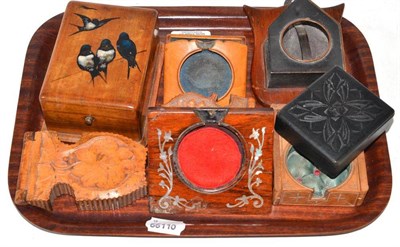 Lot 121 - A collection of eight various treen watch holders
