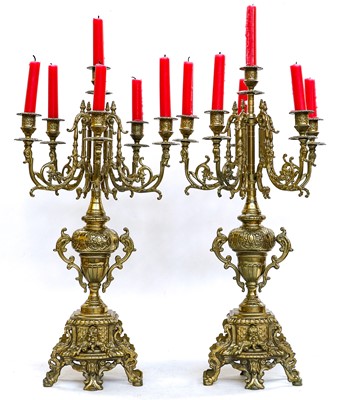 Lot 372 - A pair of gilt metal candelabra