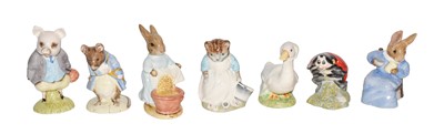 Lot 45 - Fourteen Beatrix Potter figures, boxed,...