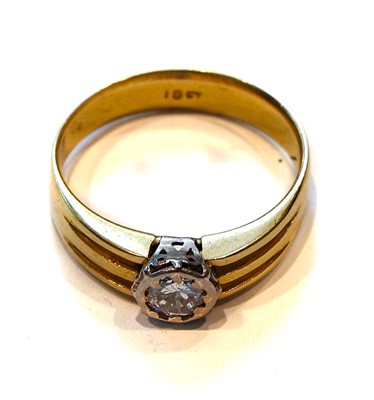 Lot 221 - A diamond solitaire ring, stamped '18CT',...