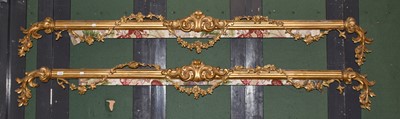 Lot 1224 - A pair of 19th century gilt and carved pelmets...