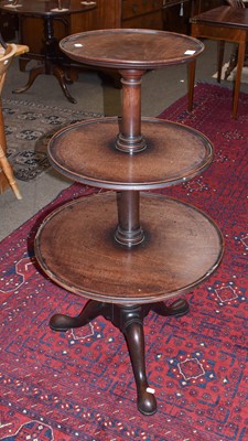 Lot 1303 - A Georgian mahogany three-tier waiter, 80cm...