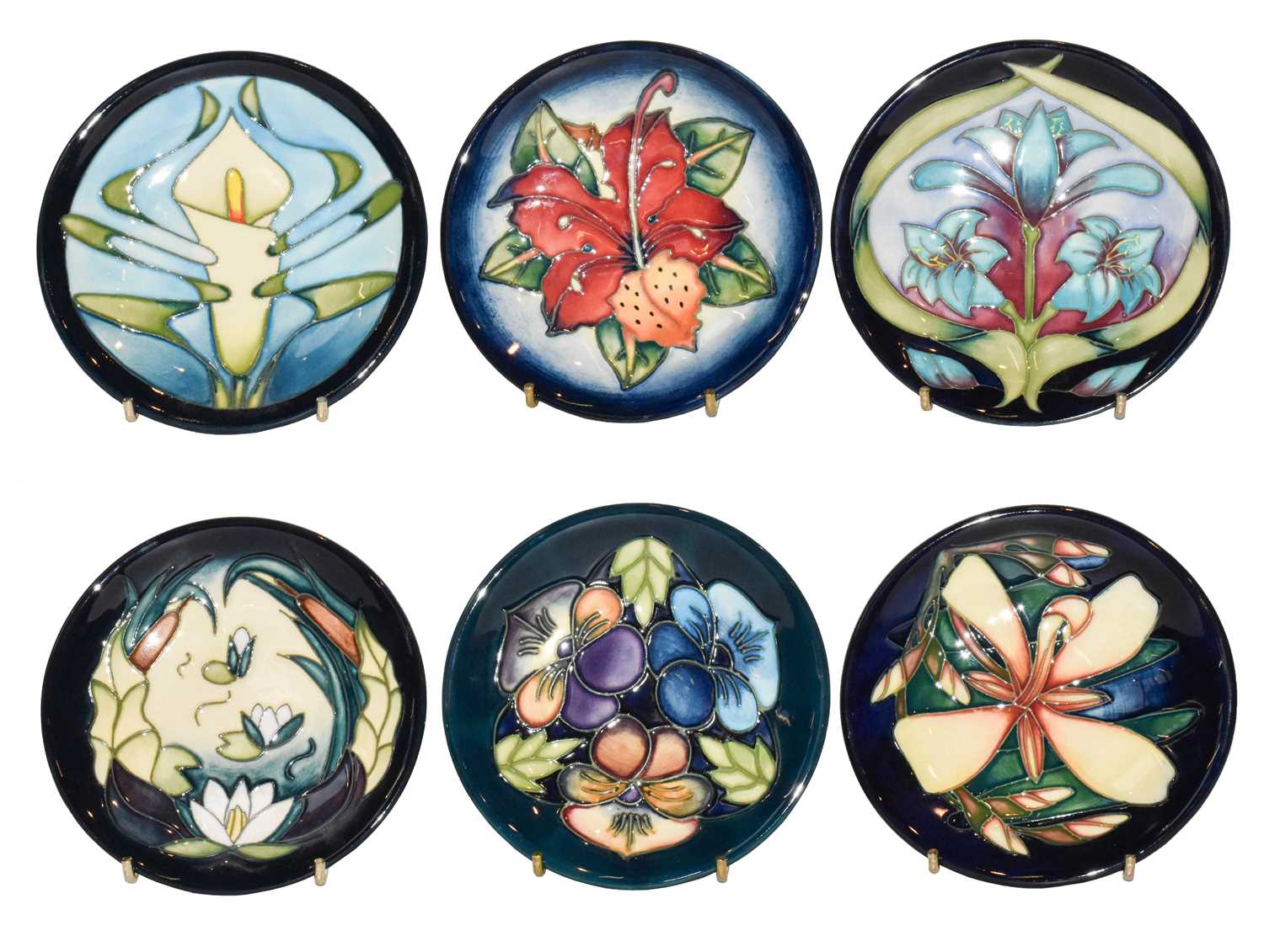 Lot 277 - Six modern Moorcroft coasters, Triple Choice,...