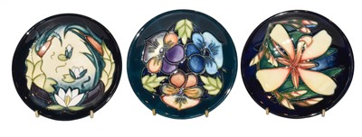 Lot 277 - Six modern Moorcroft coasters, Triple Choice,...