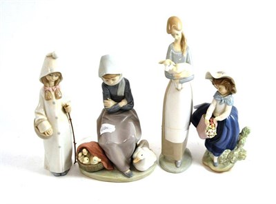 Lot 143 - Four Lladro figures and groups