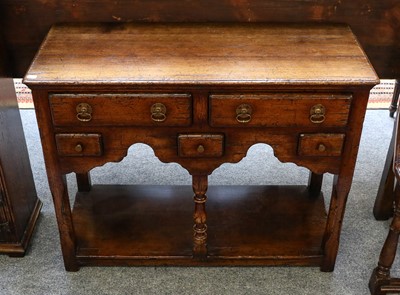 Lot 1232 - A Titchmarsh & Goodwin oak dresser base of...