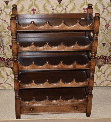 Lot 1229 - A Titchmarsh & Goodwin oak wine rack with...