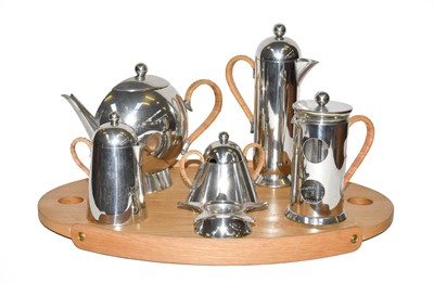 Lot 312 - A Nick Munro pewter coffee and teaset on a...