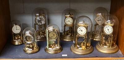 Lot 373 - Eight anniversary domed mantel timepieces, one...