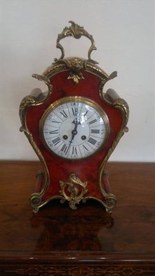 Lot 1043 - A French Tortoiseshell Striking Mantel Clock, circa 1890, applied gilt metal scroll mounts,...