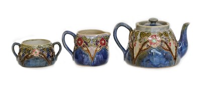 Lot 132 - Royal Doulton stoneware, three piece tea...