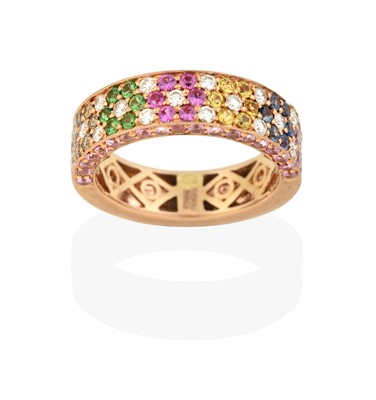 Lot 2394 - An 18 Carat Gold Multi-Gem Set Half Hoop Ring