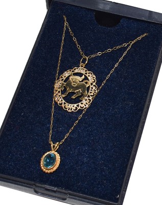 Lot 227 - A 9 carat gold blue zircon pendant on chain,...