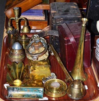 Lot 163 - Two brass wall pockets, a brass horn, a lion mask door knocker, early 20th century brass hearth...