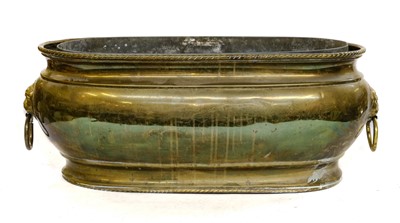 Lot 1302 - A Victorian ovoid brass planter with lion mask...