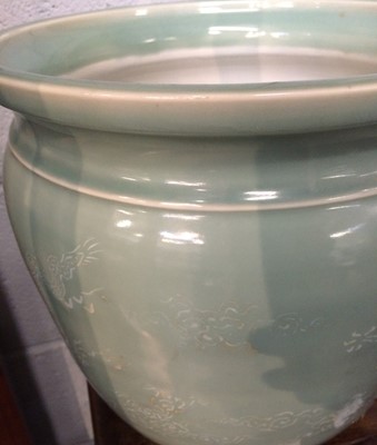 Lot 157 - A Chinese celadon glazed porcelain jardiniere...