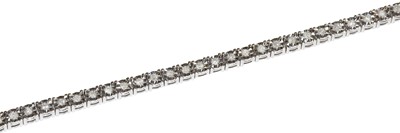 Lot 192 - A 9 carat gold diamond line bracelet, length...