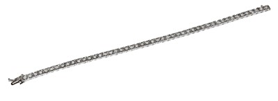 Lot 192 - A 9 carat gold diamond line bracelet, length...