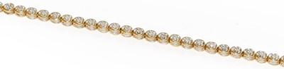 Lot 197 - A 9 carat gold diamond line bracelet, length...