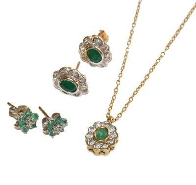 Lot 182 - A 9 carat gold emerald and diamond cluster...