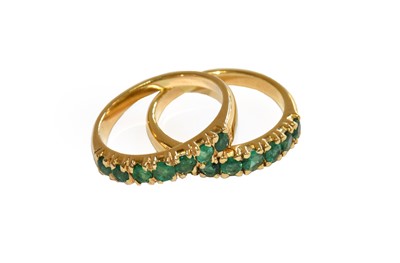 Lot 188 - Two half hoop emerald rings, finger sizes O