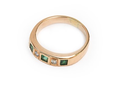 Lot 181 - An emerald and diamond five stone ring, finger...
