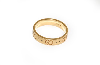 Lot 186 - A Gucci band ring, stamped '750', finger size...