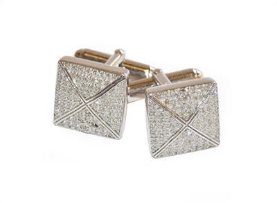 Lot 178 - A pair of diamond cufflinks NB: one diamond...