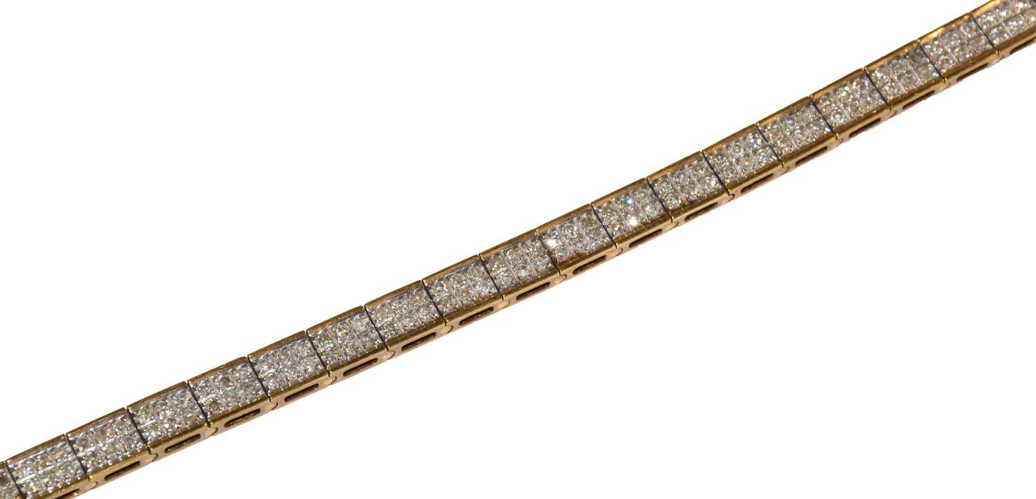 Lot 183 - A 9 carat gold diamond bracelet, length 18cm