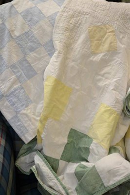 Lot 170 - Pale blue and white linen quilt and another with yellow and green patchwork (2)