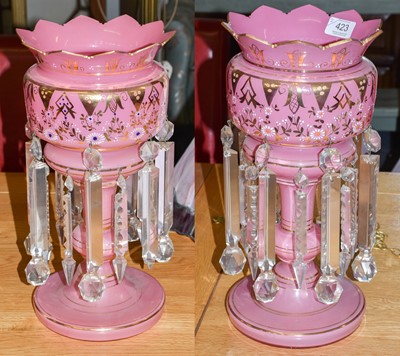 Lot 423 - A large pair of early 20th century pink opaque...