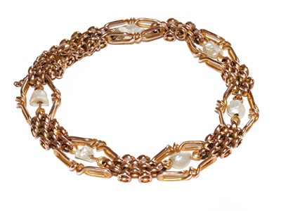 Lot 200 - A baroque pearl fancy link bracelet, unmarked,...