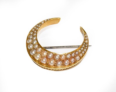 Lot 184 - A split pearl crescent brooch, unmarked,...
