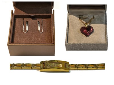 Lot 257 - A lady's Gucci wristwatch; a pair of Gucci...