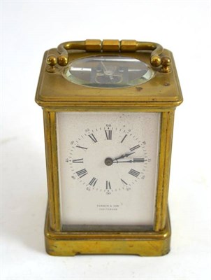 Lot 172 - A striking brass carriage clock