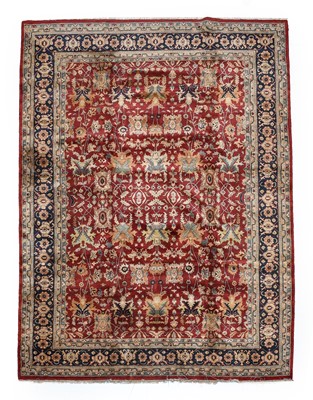 Lot 562 - Large Indian Carpet, modern The brick red...