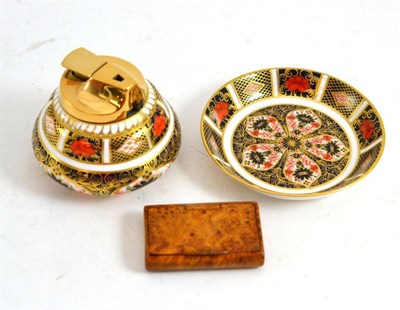 Lot 175 - Royal Crown Derby pin tray and table lighter and a snuff box (3)