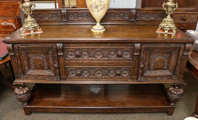 Lot 1371 - An early 20th century carved oak sideboard,...