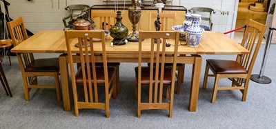 Lot 1104 - A Multiyork extending oak dining table, 260cm...