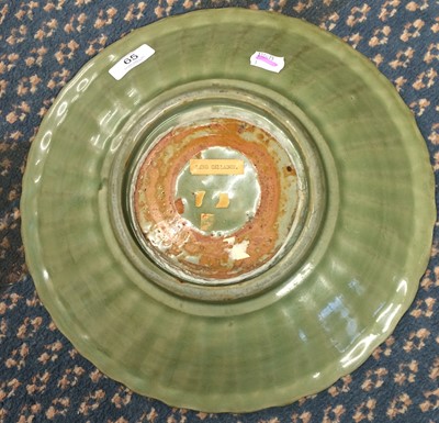 Lot 65 - A Chinese Longquan Celadon Glazed Dish,...